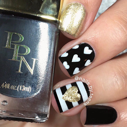 black-and-golden-nailart-with-white-stripes-and hearts