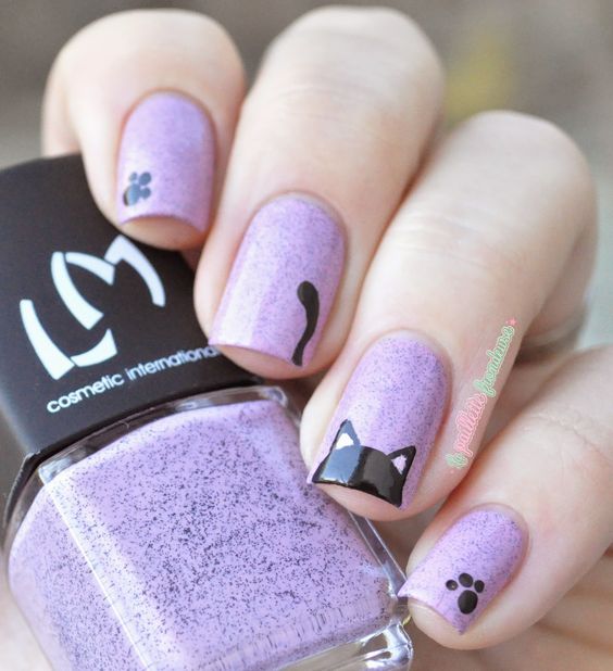 black cat on light purple nails