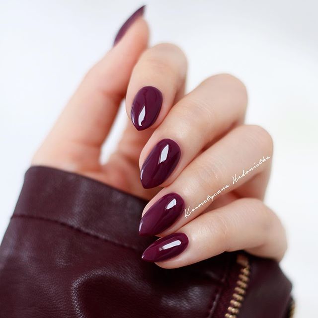 wine red nails with wine red leather jacket