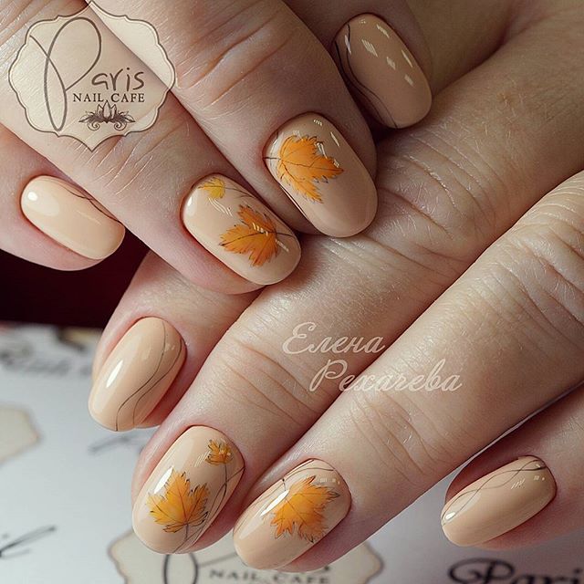 nude nail design with fall leaves