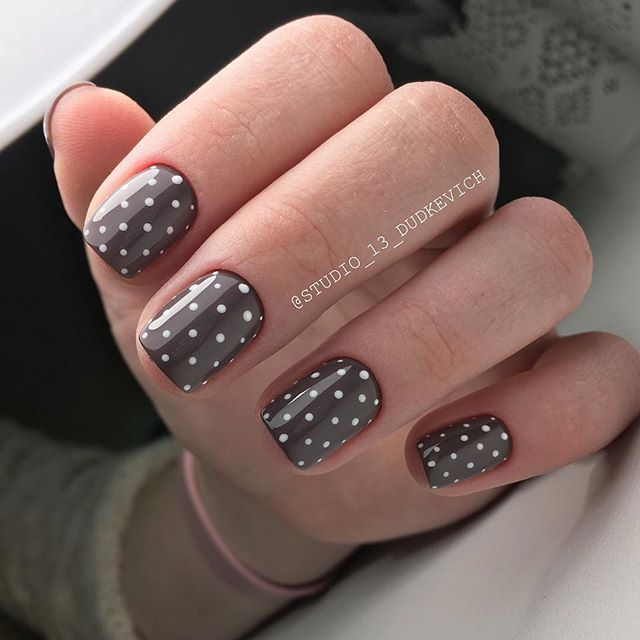 Chocolate brown nail design with white dots