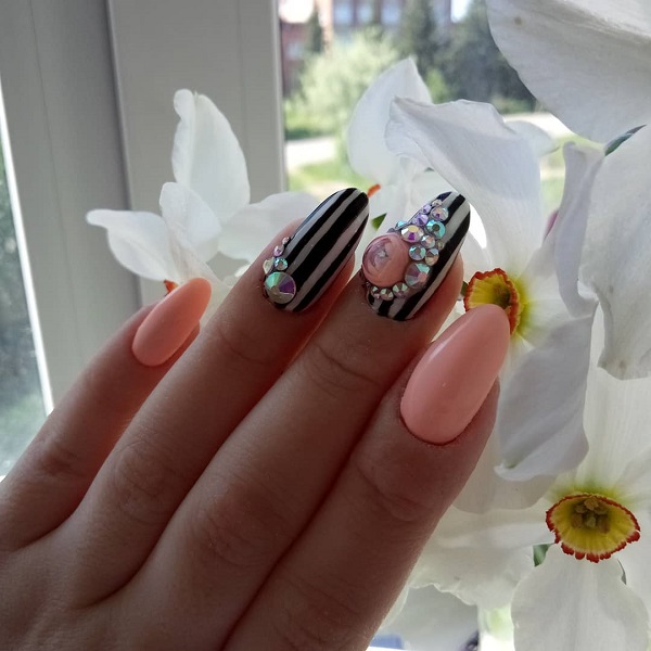 pink and black candy ball nails with stripes