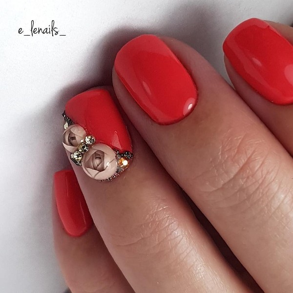 red nail design with candy ball