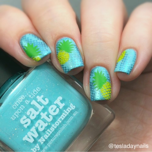 blue green and yellow pineapple nails