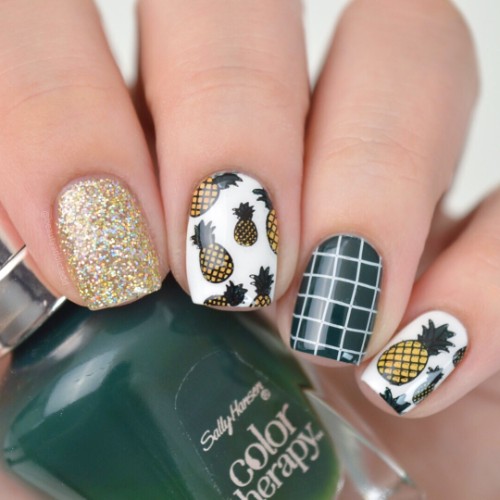 dark green pineapple nail design