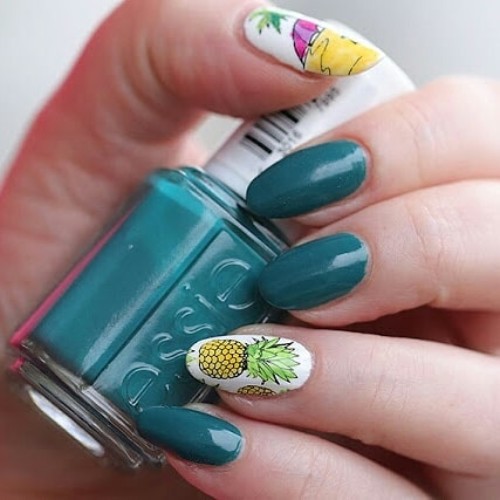 dark green summer nail design with pineapples