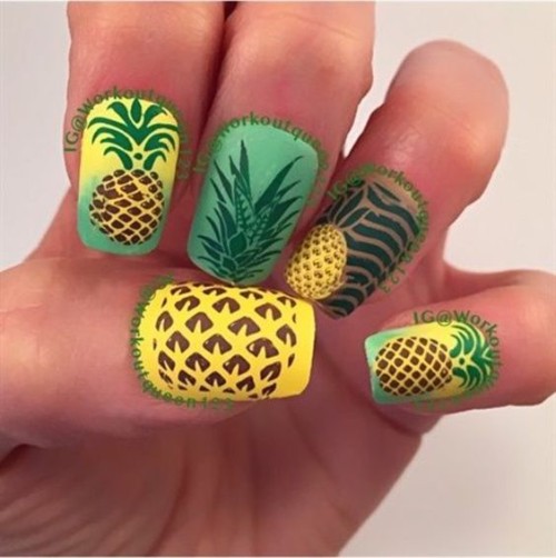 green and yellow nail design with pineapple