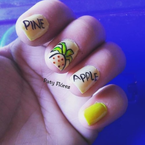 light yellow nails with pineapples