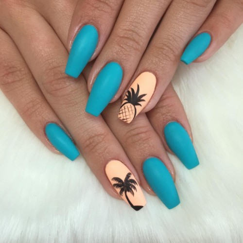 matte blue nail design with palmtree and pineapple