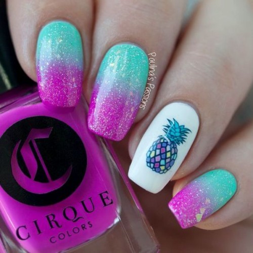 mint green and pink pineapple nails