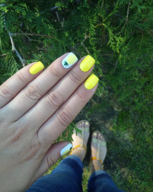 neon yellow nails with pineapple