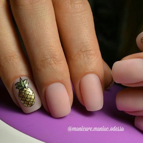 nude matte nails with golden glitter pineapple