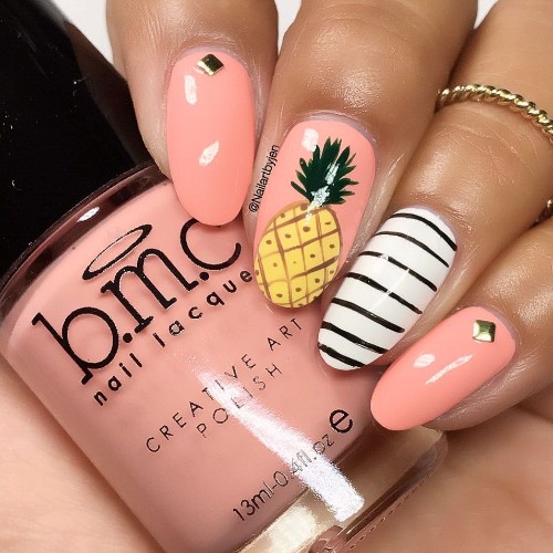 nude pink nail art with pineapple