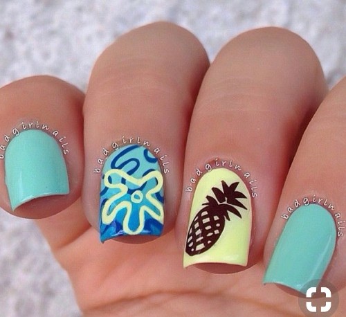 ocean green and light yellow nails with pineapples