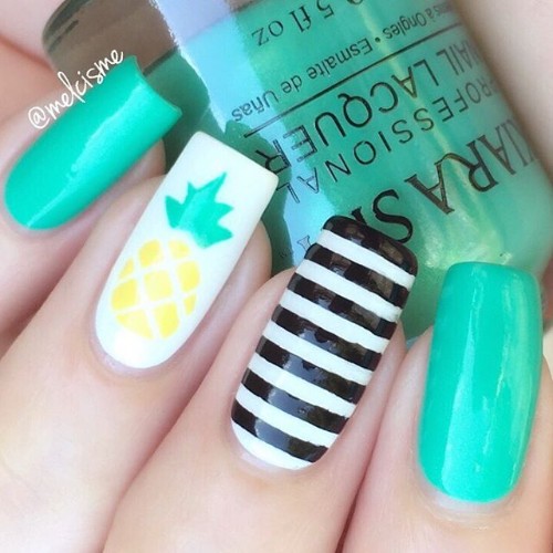 turquoise pineapple nails with black stripes