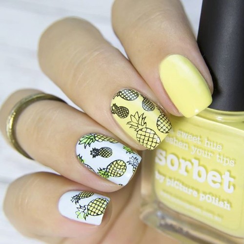 white and yellow nails with stamping pineapples