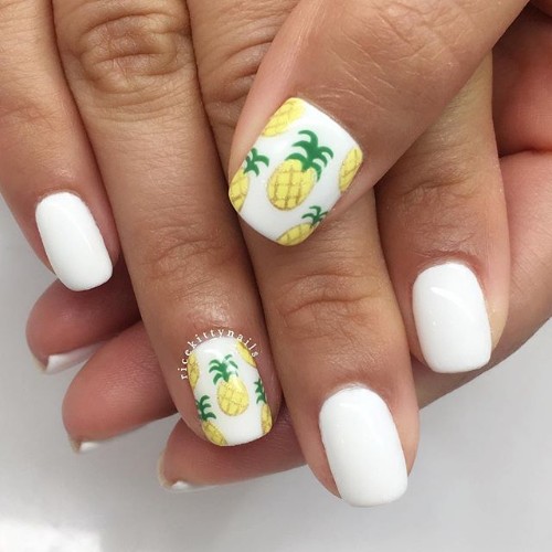 white summer nails with pineapples