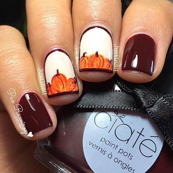 burgundy-halloween-nails-with-pumpkins