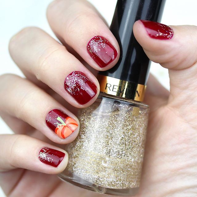 burgundy-pumpkin-nail-design