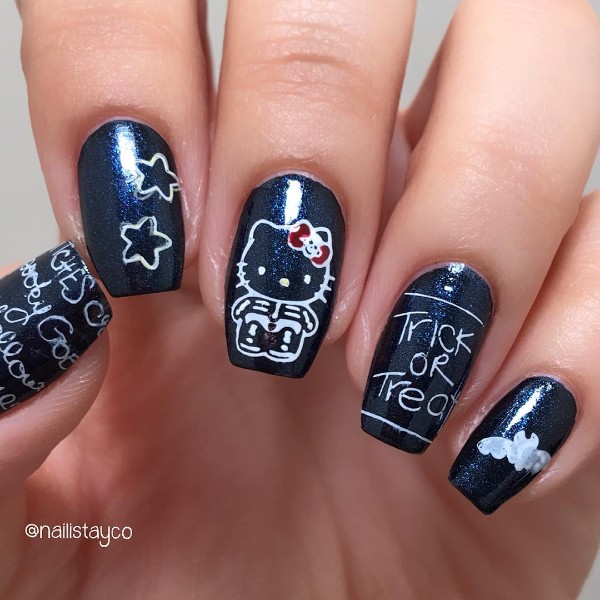 hello-kitty-skeleton-nail-design-halloween