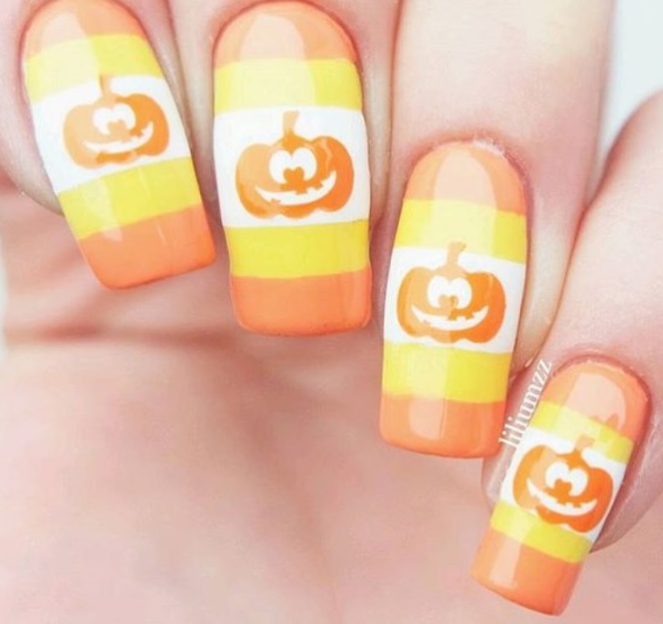 pastel-pumpkin-nail-design-with-stripes