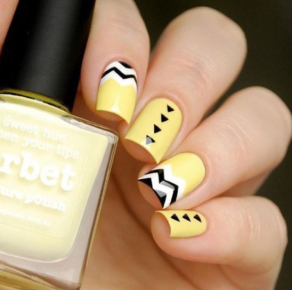 black and yellow geometric nail art