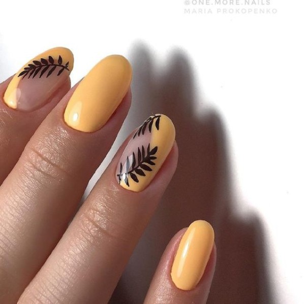 orangy yellow nails with leaves design