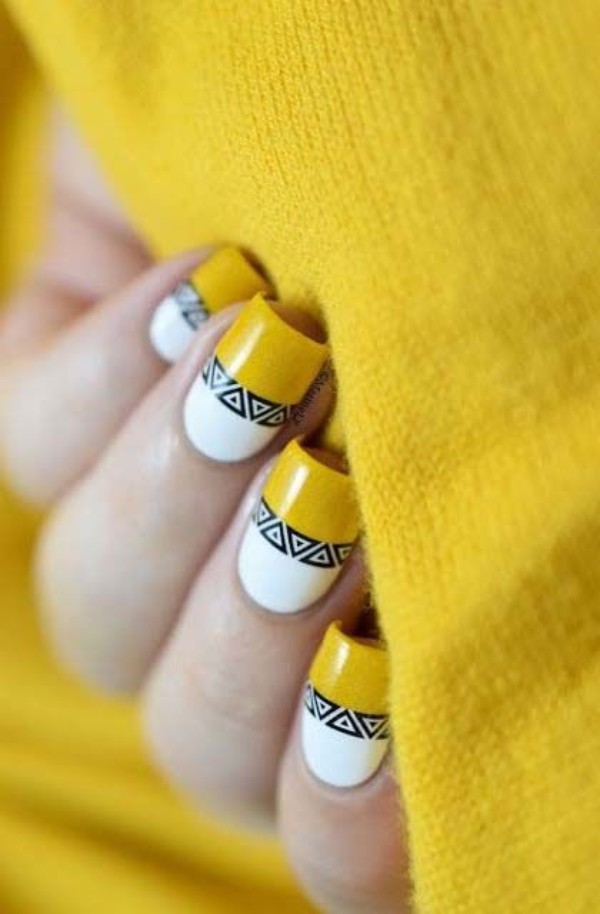 white n yellow nails with geometric design