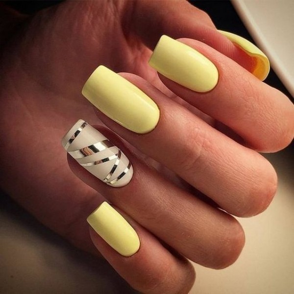 yellow mani with striping tape