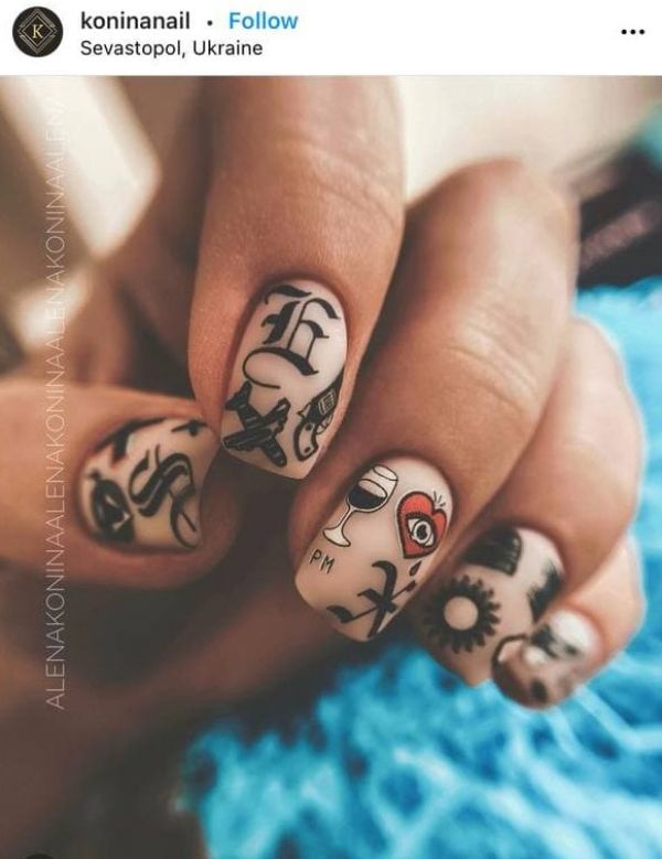 30 Photos of the Coolest Tattoo Nail Designs That Are Trendy in 2023