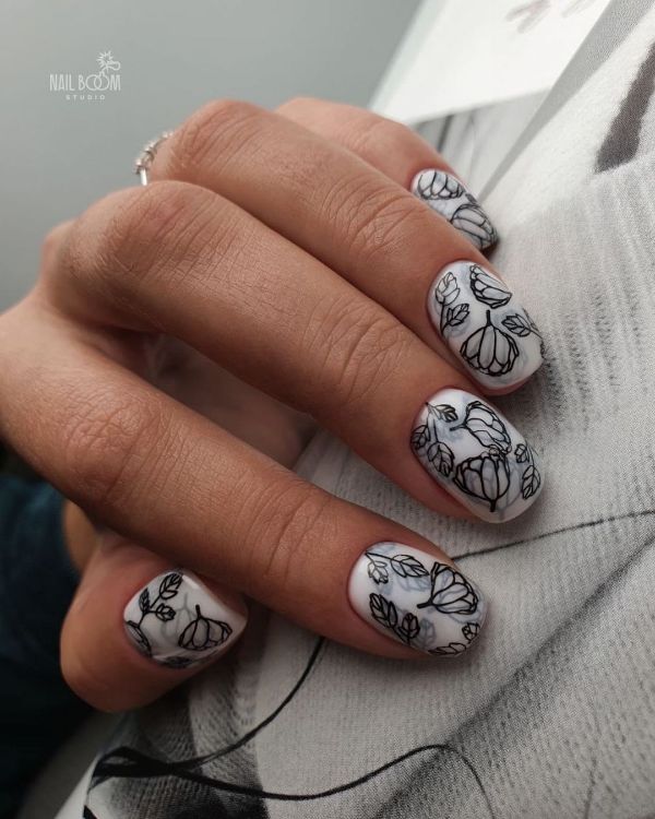 Flower Tattoo Nail Design