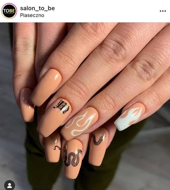 Manicure with a Beige Nail Polish and Tattoo-Like Flames and a Snake