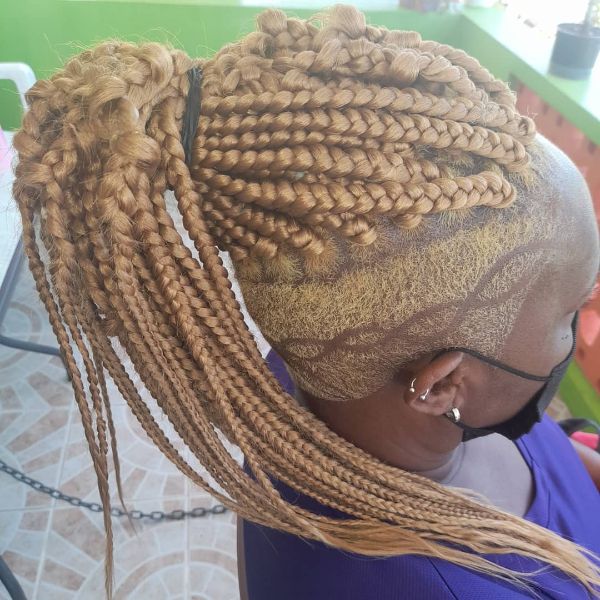 Long Blonde Jungle Braids and Undercut Sides