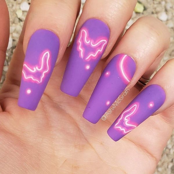 Glow in the Dark Purple Nail Design