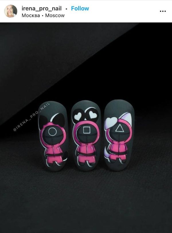 black and pink squid game nails