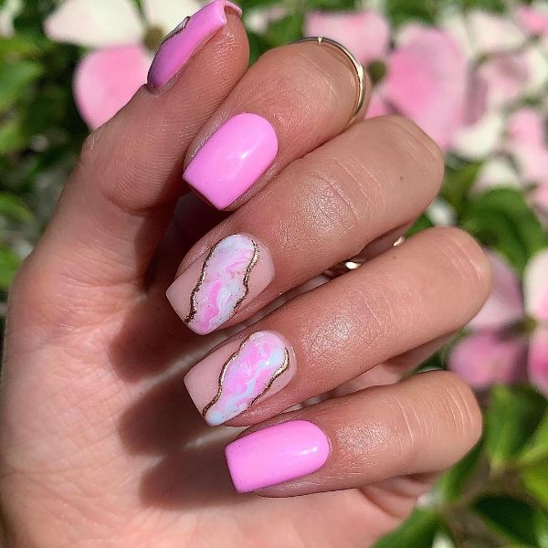 light pink nails with the marble geode design