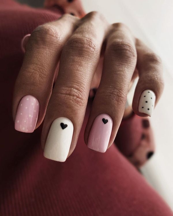 pink nails with hearts design