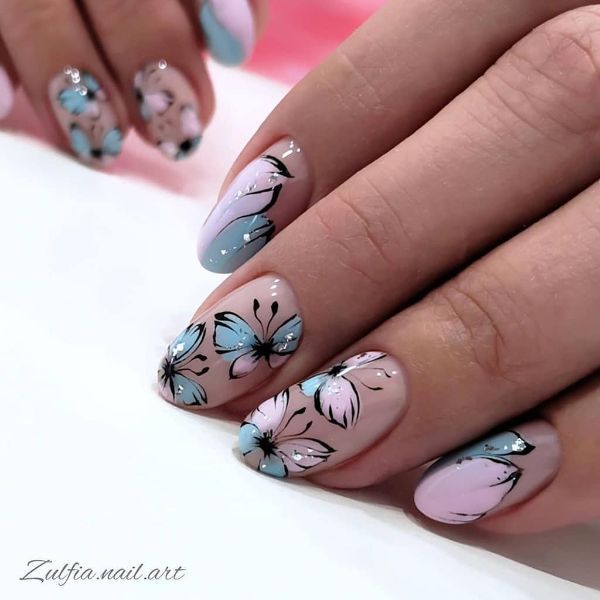 blue and pink nails design with butterflies