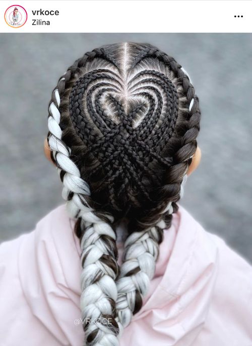 Caucasian woman with plaits and cornrow braided heart