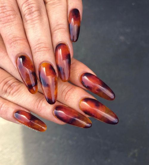 tiger eye brown nail designs with orange