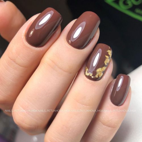 simple brown nail design with gold