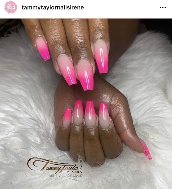 pink nail art on brown skin