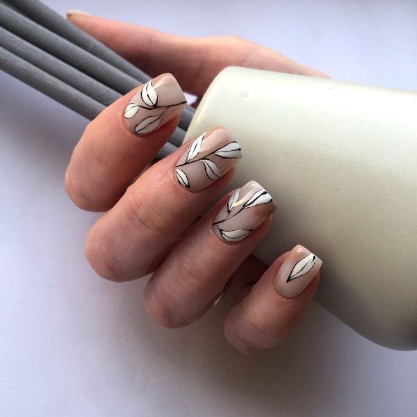 beige nails with leaves