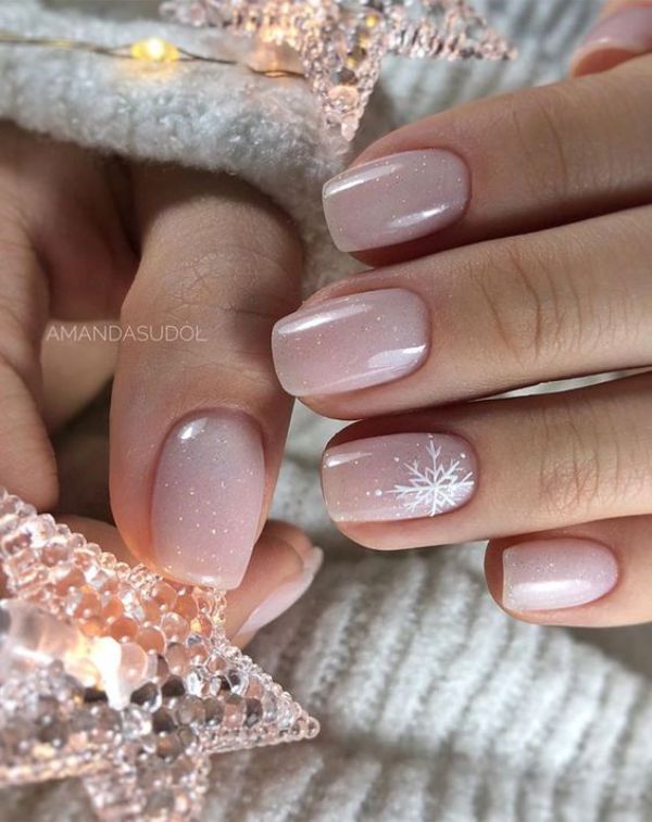Christmas winter beige nail design with snowflakes