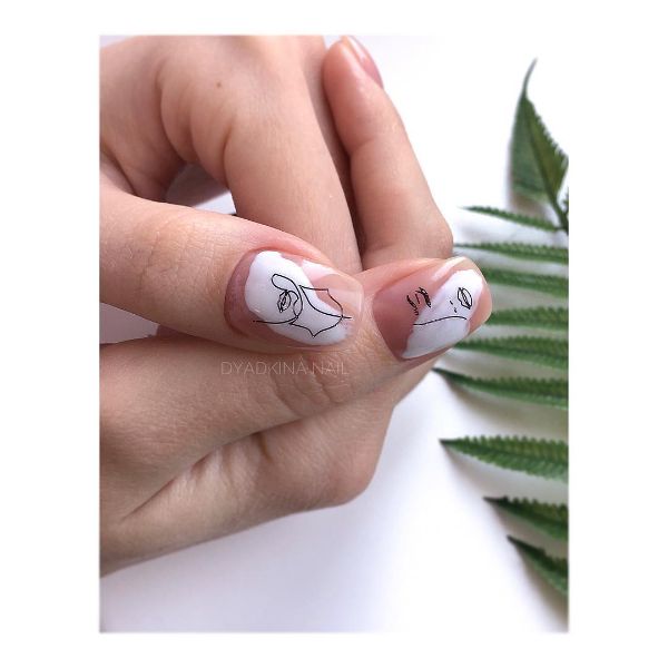 beige and white abstract nail design