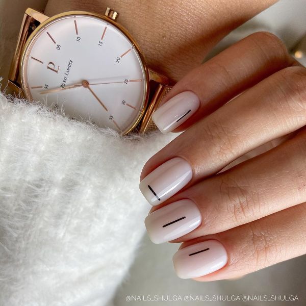pale beige nails with black lines