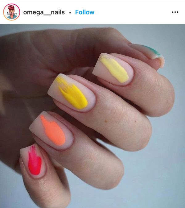 matte beige light nails with colorful brush strokes