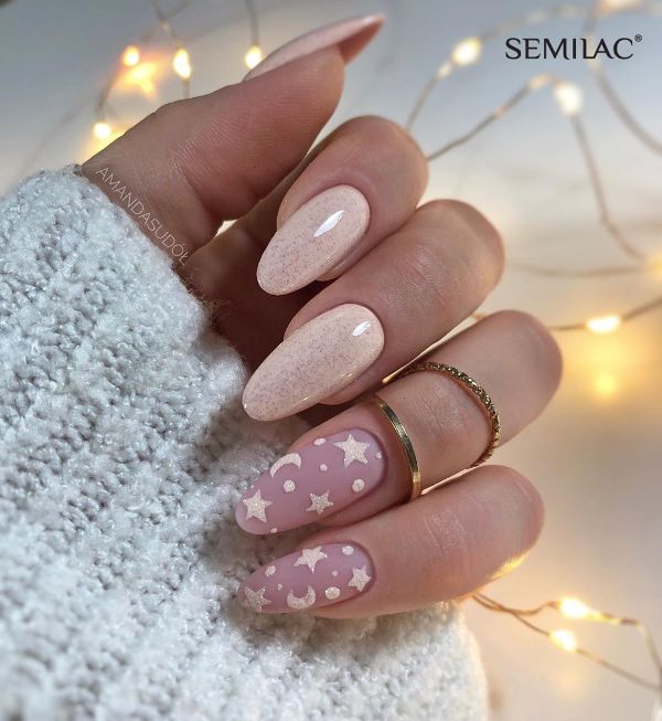 beige nails with stars and moon