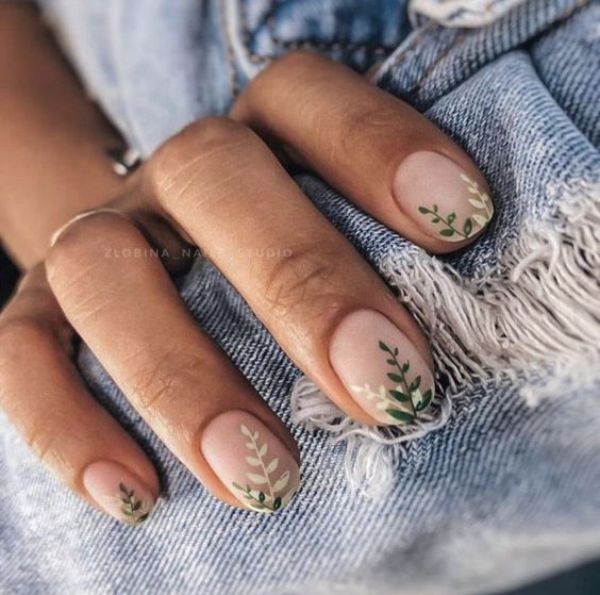beige matte nails with green and white leaves