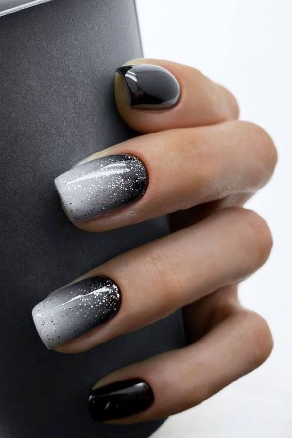 black and gray nails with glitter